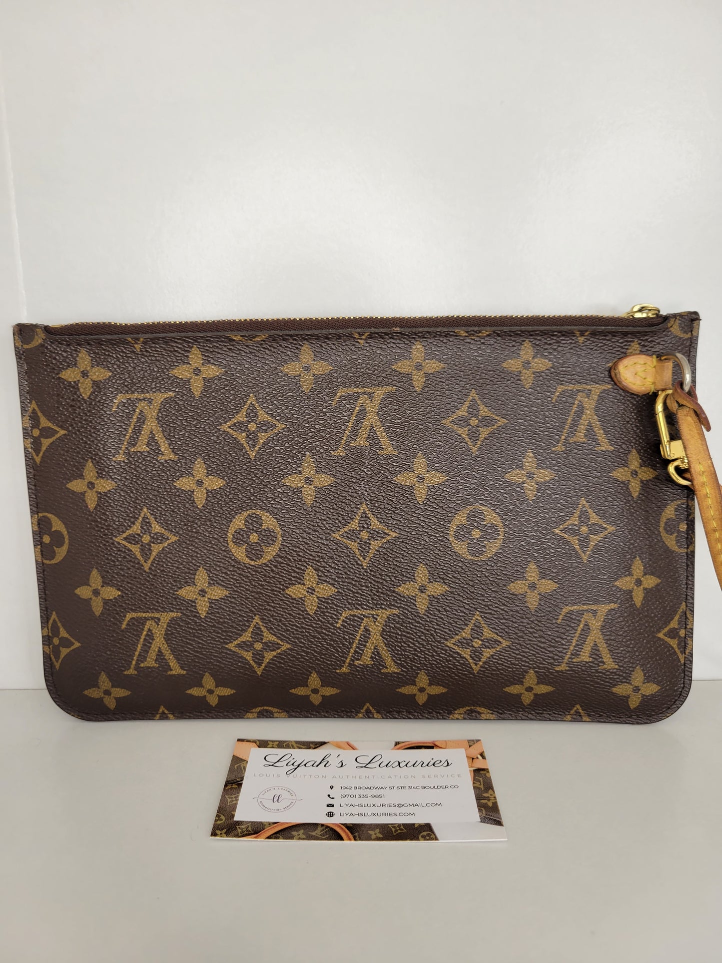 Louis Vuitton Authenticated Leather Clutch Bag