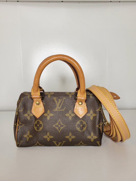 Louis Vuitton Monogram Mini Speedy w / Strap