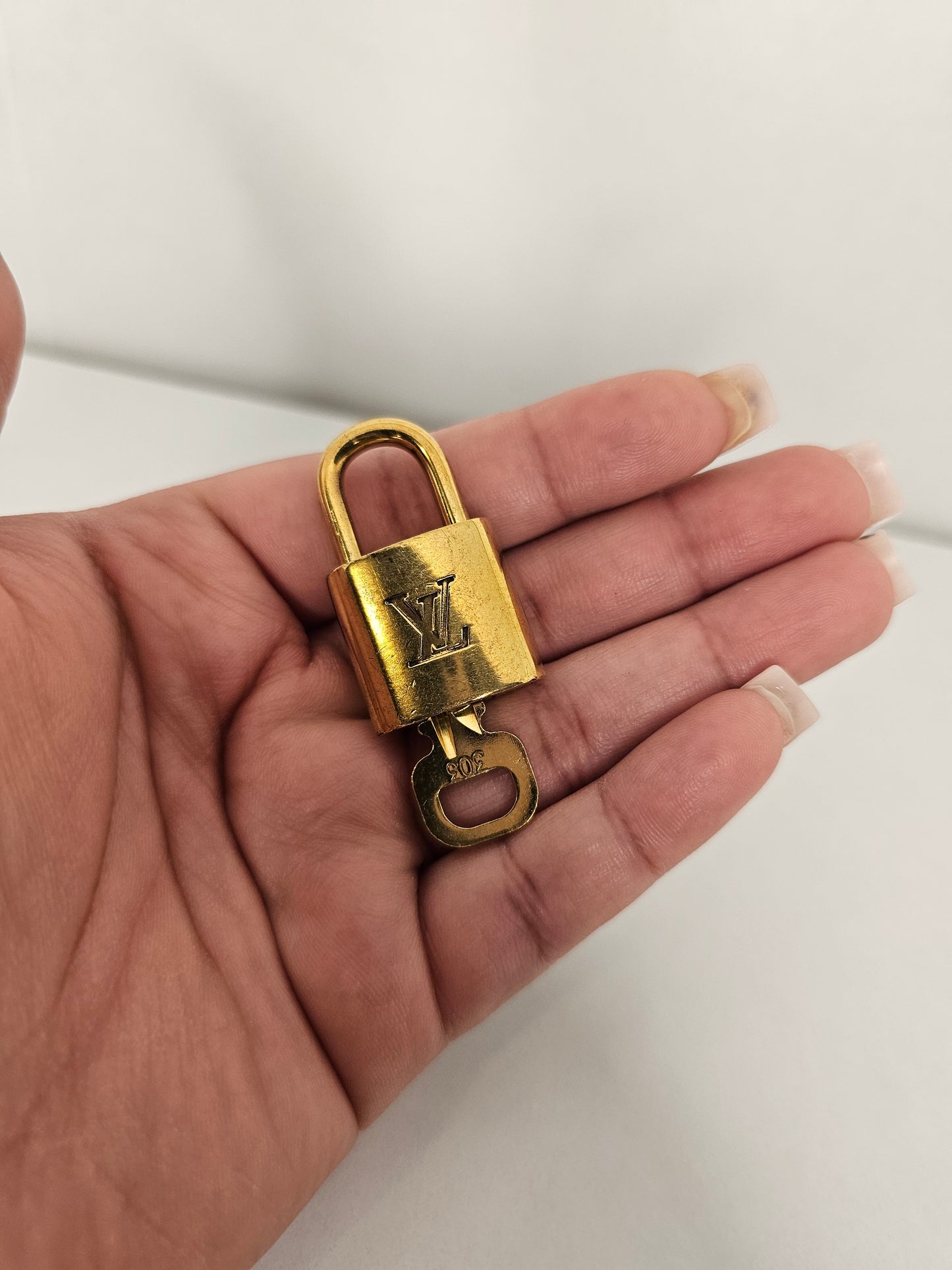 Louis Vuitton Lock and Key Set Gold Colored Brass #303